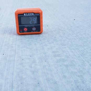 Austin Concrete Specialist - A grade tool showing 2.9 degrees which equates to a 5% slope in that spot. City of Austin allows for a maximum of 2%. - Masonry/Concrete Near Me - Austin, Texas Austin Concrete Specialist - A grade tool showing 2.9 degrees which equates to a 5% slope in that spot. City of Austin allows for a maximum of 2%. - Masonry/Concrete Near Me - Austin, Texas