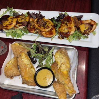 Reality Bites - Brisket potato skins?? And mac and cheese egg rolls served with honey mustard - New American Near Me - Bloomington, Illinois