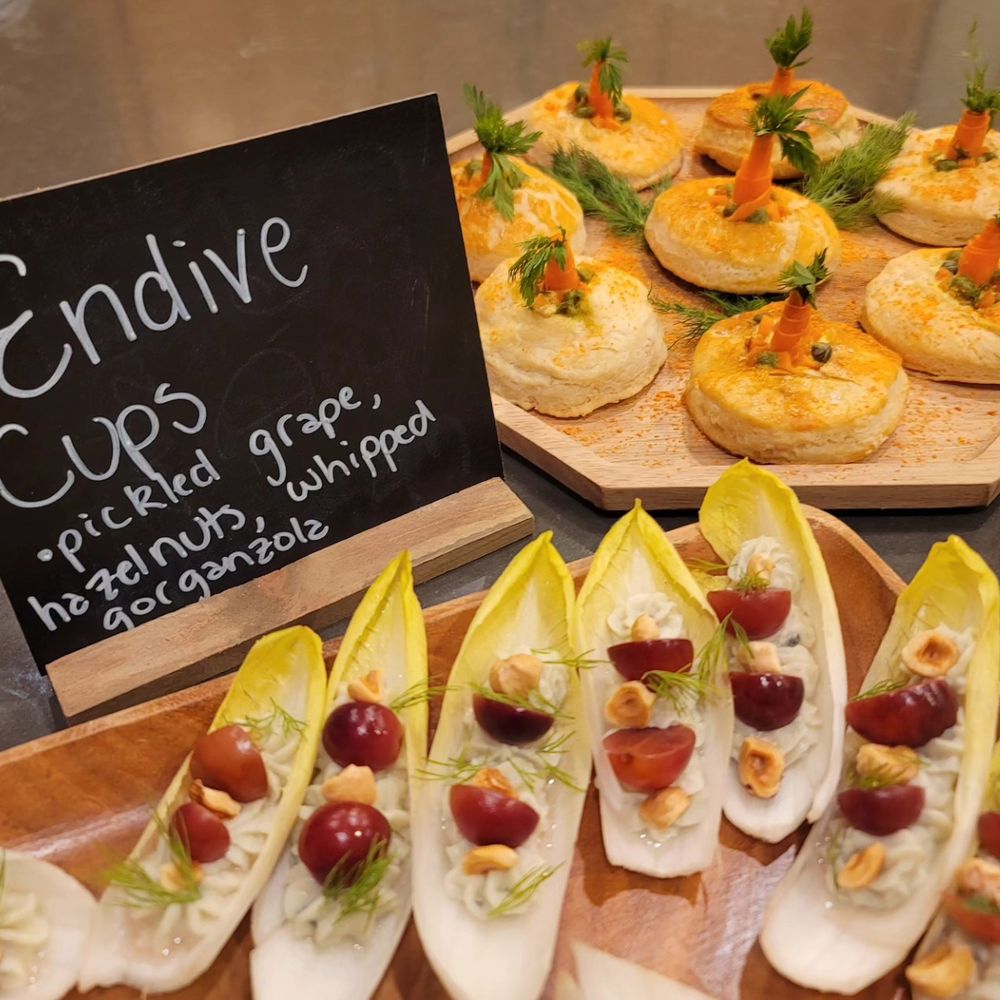 Disco Kitchen - Gorganzola Endive cups, hazelnut dill and charred grapes - Caterers Near Me