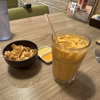 Gourmet Palace China Bistro - Thai iced tea and complimentary fried won tons with sauce. - Chinese Near Me - Simi Valley, California Gourmet Palace China Bistro - Thai iced tea and complimentary fried won tons with sauce. - Chinese Near Me - Simi Valley, California