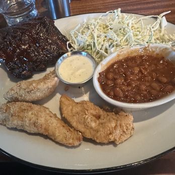 Five Four Restaurant & Drafthouse - Rib and chicken finger duo - Bars Near Me - Austin, Texas Five Four Restaurant & Drafthouse - Rib and chicken finger duo - Bars Near Me - Austin, Texas