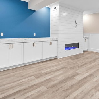 Birdland Builders - an empty living room with a fireplace - General Contractors Near Me - Millersville, Maryland Birdland Builders - an empty living room with a fireplace - General Contractors Near Me - Millersville, Maryland