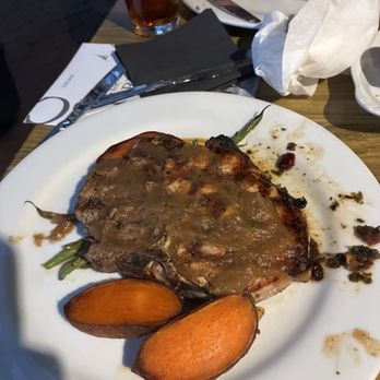 The Public Kitchen & Bar - Pork Porterhouse with baby sweet potato, haricot vert almondine, bourbon-apple butter - Bars Near Me - Savannah, Georgia