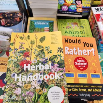 Five Below - Books on a store shelf include 'Herbal Handbook' and 'Would You Rather? Family Challenge!'. - Discount Store Near Me - Indianapolis, Indiana