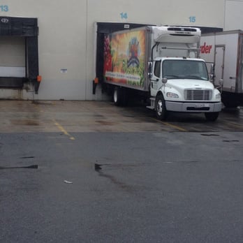 The Class Produce Group - two trucks parked in a parking lot - Fruits & Veggies Near Me - Jessup, Maryland The Class Produce Group - two trucks parked in a parking lot - Fruits & Veggies Near Me - Jessup, Maryland