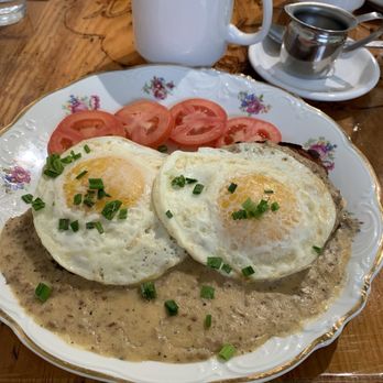 Lazy Daisy's Cafe - Sausage gravy with biscuits and over easy eggs - Cafes Near Me - Toronto, Ontario