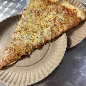 Mimmo's Pizza Ristorante - One slice takes up two plates - Pizza Near Me - Cocoa Beach, Florida Mimmo's Pizza Ristorante - One slice takes up two plates - Pizza Near Me - Cocoa Beach, Florida