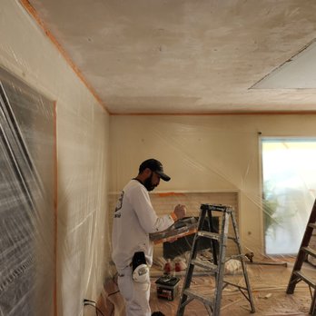 RonDell Restoration - a man painting a room - Damage Restoration Near Me - Garden Grove, California