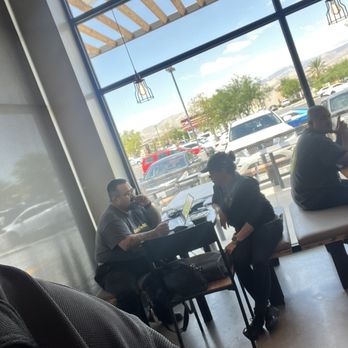 Ono Hawaiian BBQ - Management having a meeting. - Hawaiian Near Me - Indio, California
