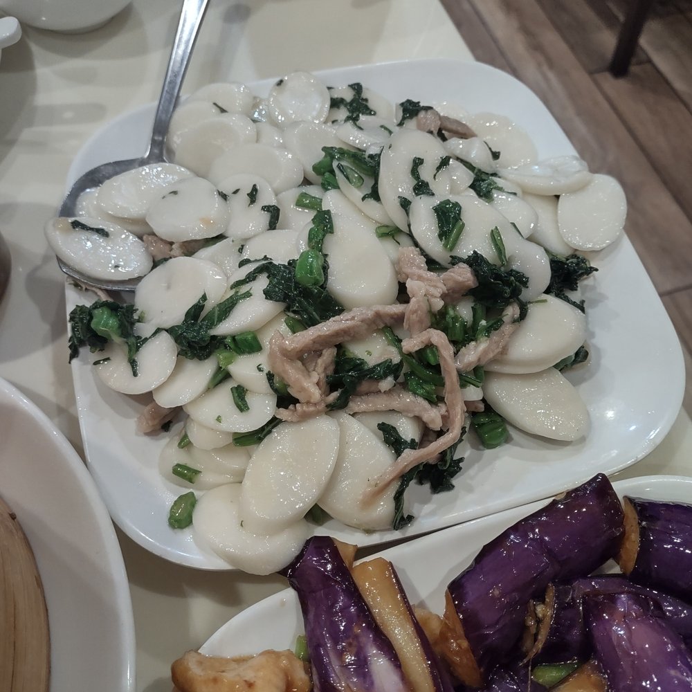 Soup Dumpling Plus - Nian gao (rice cakes with cabbage and pork). - Shanghainese Near Me - Fort Lee, New Jersey Soup Dumpling Plus - Nian gao (rice cakes with cabbage and pork). - Shanghainese Near Me - Fort Lee, New Jersey