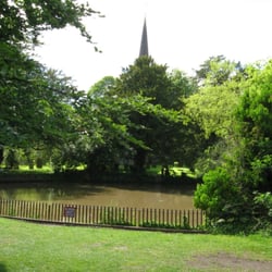 The spire is just visible across the pond.