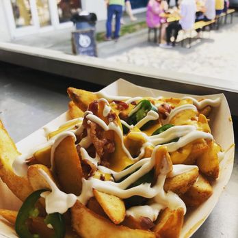 Prowl - Campfire fries. Fresh jalapeño, cheese sauce, sour cream drizzle and bacon crumble - Food Trucks Near Me Prowl - Campfire fries. Fresh jalapeño, cheese sauce, sour cream drizzle and bacon crumble - Food Trucks Near Me