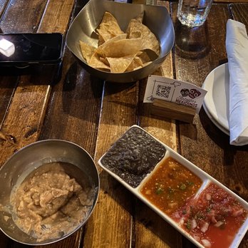 Antojitos Mexicanos - Chips salsa and additional vegetarian beans. Normal beans have chorizo - Mexican Near Me - Appleton, Wisconsin