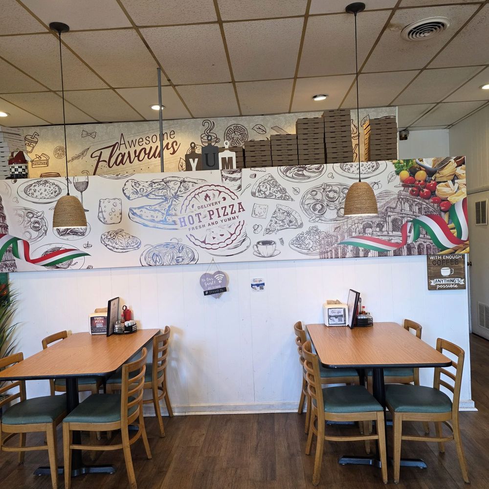 Tivoli Pizza - The dining tables and chairs. - Pizza Near Me - Salem, Virginia Tivoli Pizza - The dining tables and chairs. - Pizza Near Me - Salem, Virginia