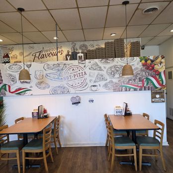 Tivoli Pizza - The dining tables and chairs. - Pizza Near Me - Salem, Virginia Tivoli Pizza - The dining tables and chairs. - Pizza Near Me - Salem, Virginia