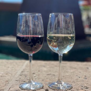 Marketplace Grille - two glasses of white and red wine - Mediterranean Near Me - San Diego, California Marketplace Grille - two glasses of white and red wine - Mediterranean Near Me - San Diego, California