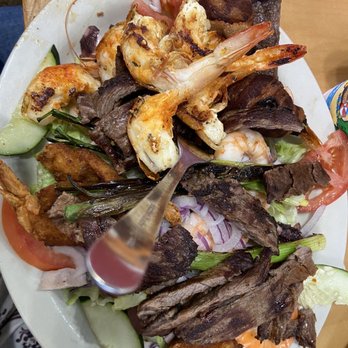 Mariscos Mazatlan - Served on a bed of lettuce, tomato, cucumber,. Grilled, fresh, breaded, bacon wrapped shrimp, octopus, and juicy fajita. - Seafood Near Me - Oklahoma City, Oklahoma Mariscos Mazatlan - Served on a bed of lettuce, tomato, cucumber,. Grilled, fresh, breaded, bacon wrapped shrimp, octopus, and juicy fajita. - Seafood Near Me - Oklahoma City, Oklahoma