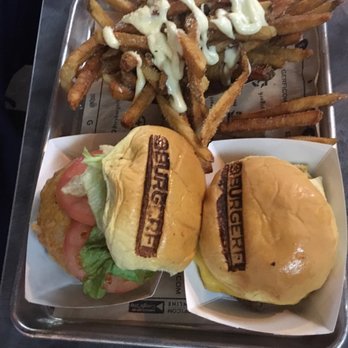 BurgerFi - Conflicted burger (beef pattie and veggie pattie) and kid's burger with a side of Parmesan and garlic aioli fries - Hot Dogs Near Me - Brooklyn, New York