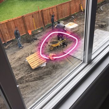 Pure landscape design and construction - Kid is playing around - Landscaping Near Me