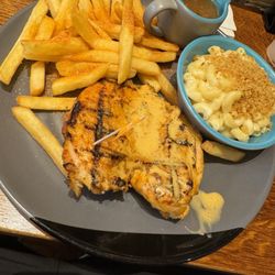 Nando's - Butterfly chicken with chips and Mac and cheese