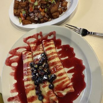 Just Breakfast on Silverbell - Lemon blueberry, crêpes and homemade fries with peppers and onions. Hit the spot. - Breakfast & Brunch Near Me - Tucson, Arizona Just Breakfast on Silverbell - Lemon blueberry, crêpes and homemade fries with peppers and onions. Hit the spot. - Breakfast & Brunch Near Me - Tucson, Arizona