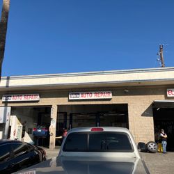 Vic's Auto Repair & Tire Center - Front of shop from the shared parking lot area