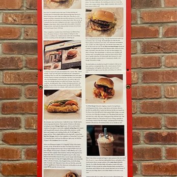 Devil Dawgs -  South State -  poster on a brick wall - Hot Dogs Near Me - Chicago, Illinois