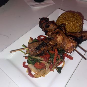 Little Lagos - Steak kabobs with jollof rice - African Near Me - Atlanta, Georgia Little Lagos - Steak kabobs with jollof rice - African Near Me - Atlanta, Georgia