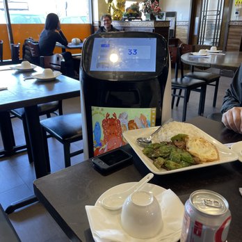 Zodiac - a man sitting at a table with a plate of food in front of him - Chinese Near Me - South Plainfield, New Jersey Zodiac - a man sitting at a table with a plate of food in front of him - Chinese Near Me - South Plainfield, New Jersey