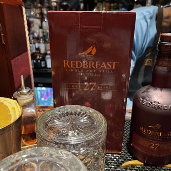 Whiskeys - a bottle of redbreast and glasses - Whiskey Bars Near Me - Dallas, Texas Whiskeys - a bottle of redbreast and glasses - Whiskey Bars Near Me - Dallas, Texas