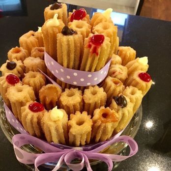 La Catrina - I thought I'm buying churro cake like this but get pic 2 instead! And no cooler for ice cream! I got a churro bowl in ice cream melt! - Desserts Near Me - Ottawa, Ontario