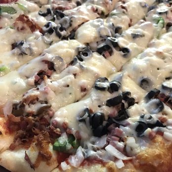 Bruno’s Pizza - The famous scissor-cut pizza. If you want yours done, request a full bake. - Pizza Near Me - West Lafayette, Indiana