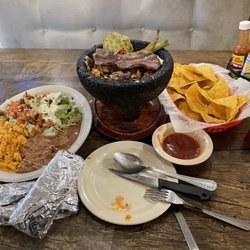 El Centenario Mexican Grill - Molcajete 9/10 Came out so hot and fresh!