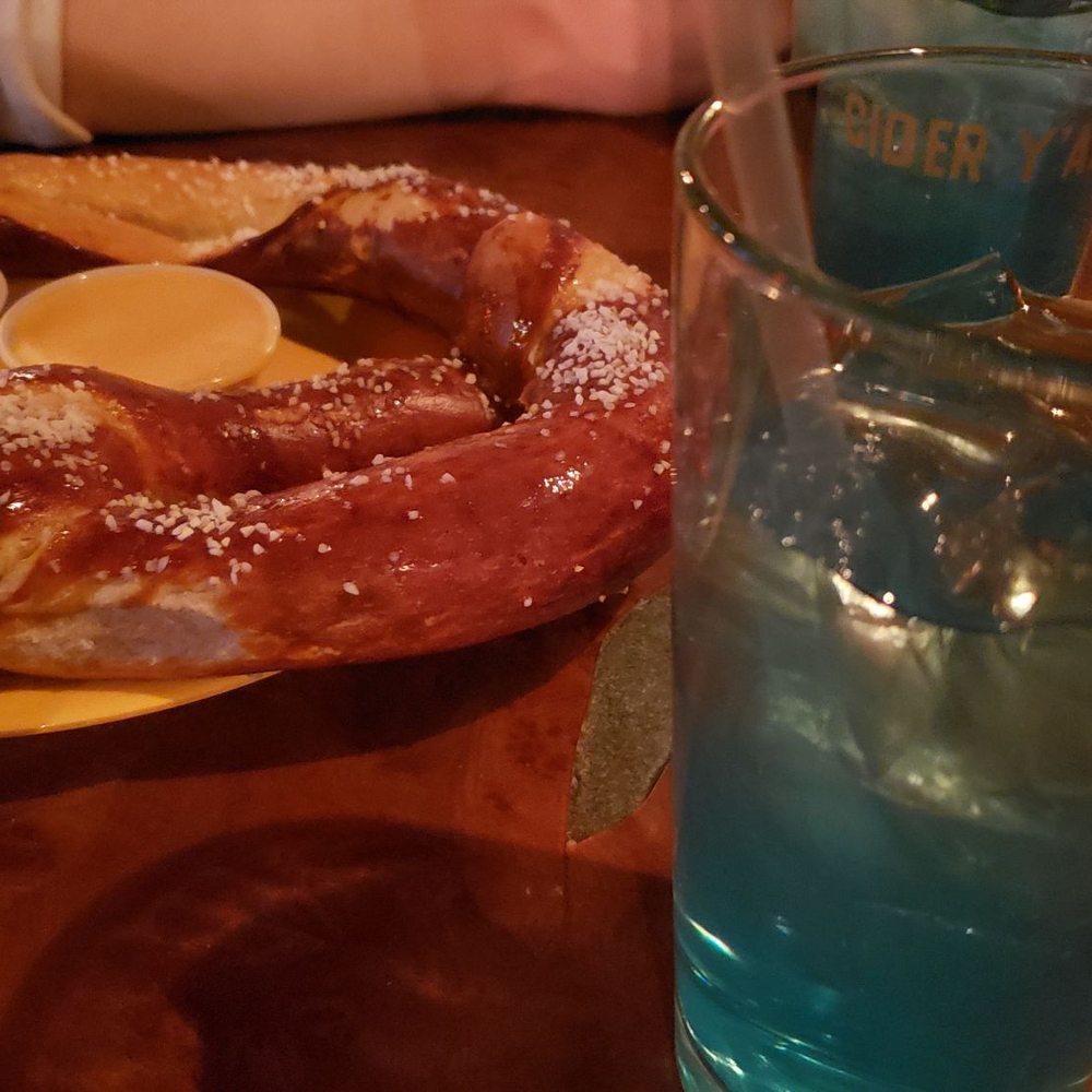 Captain Dan's Good Time Tavern - Giant pretzel with a Blue Motorcycle - Bars Near Me - Brooklyn, New York Captain Dan's Good Time Tavern - Giant pretzel with a Blue Motorcycle - Bars Near Me - Brooklyn, New York