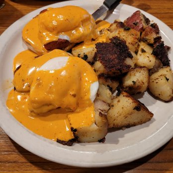 Red Apple Cafe - Hot link Benedict with chipotle hollandaise and country potatoes. - Breakfast & Brunch Near Me - Fresno, California Red Apple Cafe - Hot link Benedict with chipotle hollandaise and country potatoes. - Breakfast & Brunch Near Me - Fresno, California