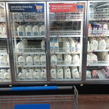 Walmart Supercenter - a cart full of milk in a grocery store - Department Stores Near Me - Center, Texas Walmart Supercenter - a cart full of milk in a grocery store - Department Stores Near Me - Center, Texas
