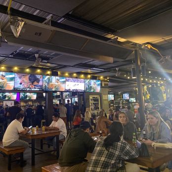 McIntyre's Heights - Houston Astros fans watching the play off - Bars Near Me - Houston, Texas