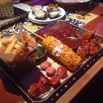 Chili's - Choose 3 baby back ribs honey barbecue chicken crispers, jalapeño cheddar sausage, frenchfries , awesome corn on the cob - American Near Me - Chelsea, Massachusetts