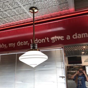 Mel's Diner - a man taking a picture of himself - American Near Me - Fremont, Nebraska
