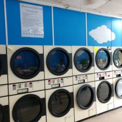 Beverly's Laundromat - They are looking at the inside of the laundry.