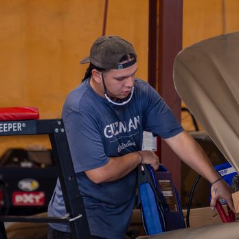 Guzman Automotive - Technician working at Guzman Automotive in Taylor, Texas. - Auto Repair Near Me - Taylor, Texas Guzman Automotive - Technician working at Guzman Automotive in Taylor, Texas. - Auto Repair Near Me - Taylor, Texas