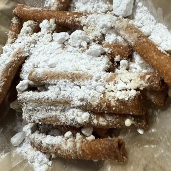 Firecracker’s Pizza Pleasant View - Half eaten funnel fries. They didn't look good and were greasy, but were fantastic! Plus, easier to share with the table - Pizza Near Me - Pleasant View, Tennessee