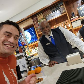 American Express Centurion Lounge - Charles, the host with the most! Grab a signature drink while you're here - Airport Lounges Near Me - Houston, Texas American Express Centurion Lounge - Charles, the host with the most! Grab a signature drink while you're here - Airport Lounges Near Me - Houston, Texas