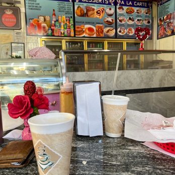 Paloma Blanca Cafe - a cup of coffee and a plate of food - Cuban Near Me - Naples, Florida Paloma Blanca Cafe - a cup of coffee and a plate of food - Cuban Near Me - Naples, Florida