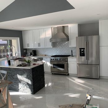Ancora Construction - a kitchen and dining area - General Contractors Near Me Ancora Construction - a kitchen and dining area - General Contractors Near Me
