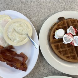 Coffee House Waffle Shop # 909 - Griddle Breakfast Belgian waffle, 2 eggs, grits and bacon