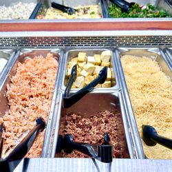 Whole Foods Market - Major cross contamination going on with vegan baked tofu, smelly rancid salmon, bacon bits, and shredded cheese.