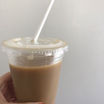 Hunter Coffee Shop - a hand holding a cup of coffee - Coffee & Tea Near Me - Toronto, Ontario Hunter Coffee Shop - a hand holding a cup of coffee - Coffee & Tea Near Me - Toronto, Ontario