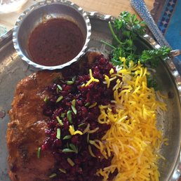 Our main chicken on the left, pilaf on the right and middle and that pretty middle is the berries. They are dried Our main chicken on the left, pilaf on the right and middle and that pretty middle is the berries. They are dried
