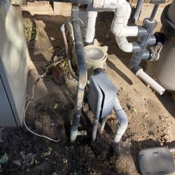 David Pierce Pool Service and Repair - Cutting out old leaky copper plumbing.